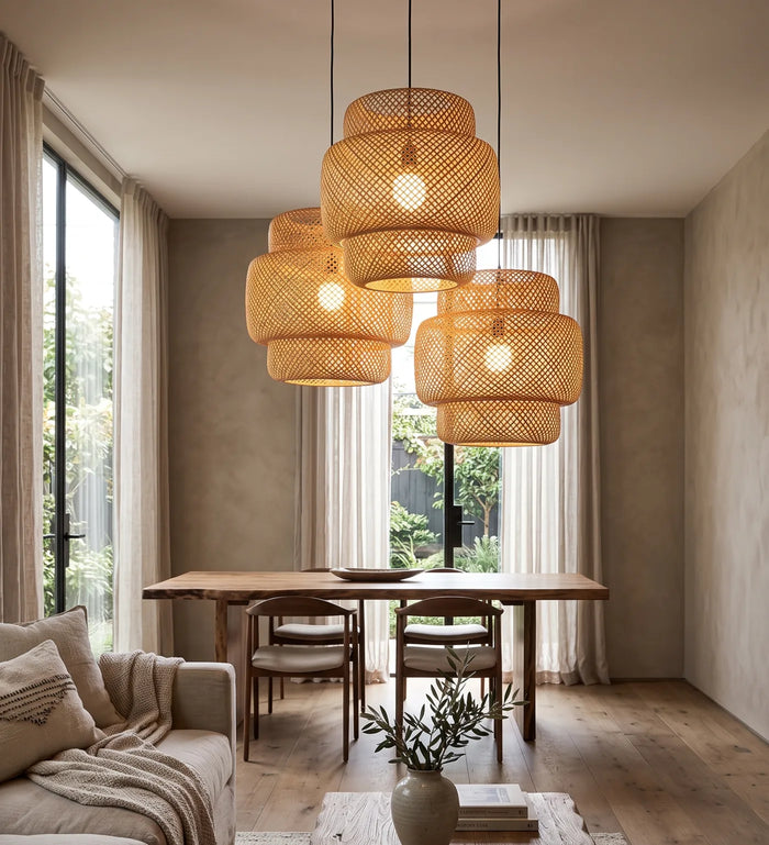 The Beehive, a cluster of handwoven bamboo pendant shades above a dining table
